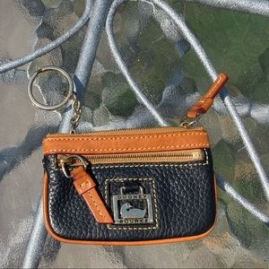 Dooney and Bourke Dillon leather coin case with inside key ring